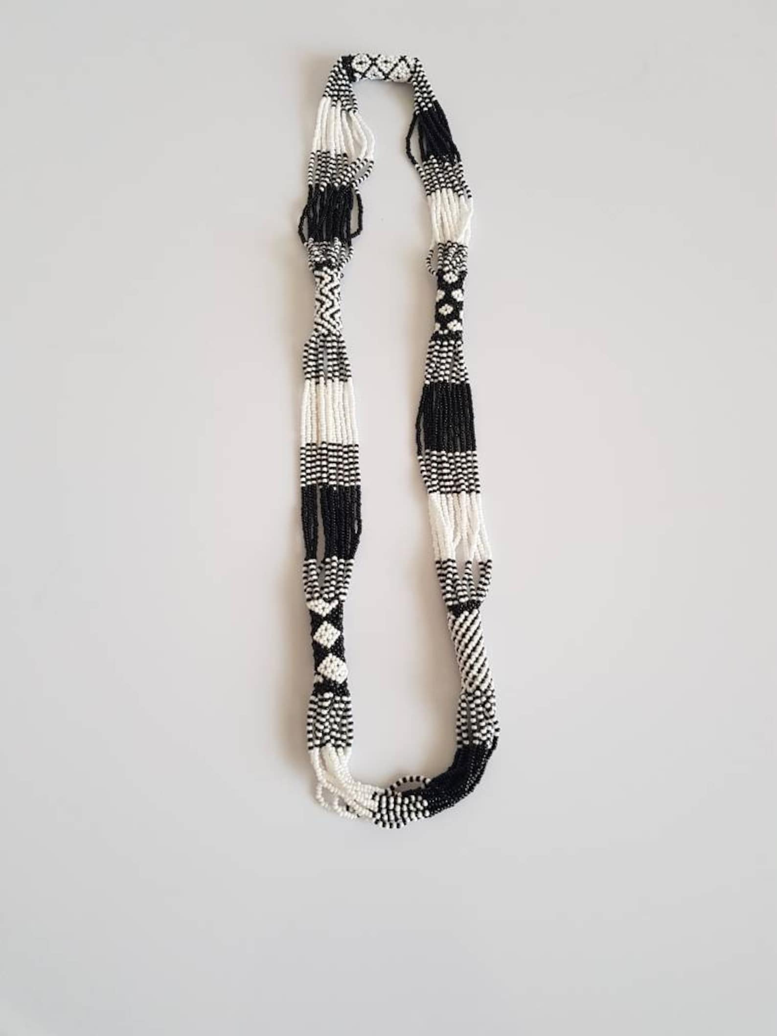 Black and white beaded necklace. 2 Black and white beaded necklace.