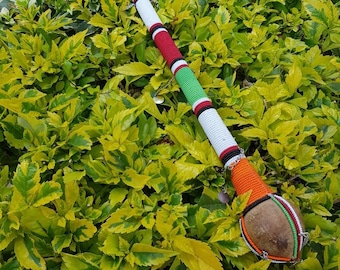Maasai rungu, Maasai tribe stick, short walking stick, Masai Kenya stick, Beaded wooden stick. 1 Maasai rungu, Maasai tribe stick, short
walking stick, Masai Kenya stick, Beaded wooden stick.