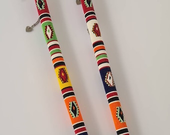 African Maasai rungu, Maasai tribe stick, short stick, Masai Kenya stick, Beaded wooden stick, Colorful beaded stick. 1 African Maasai rungu, Maasai tribe stick,
short stick, Masai Kenya stick, Beaded wooden stick, Colorful beaded stick.